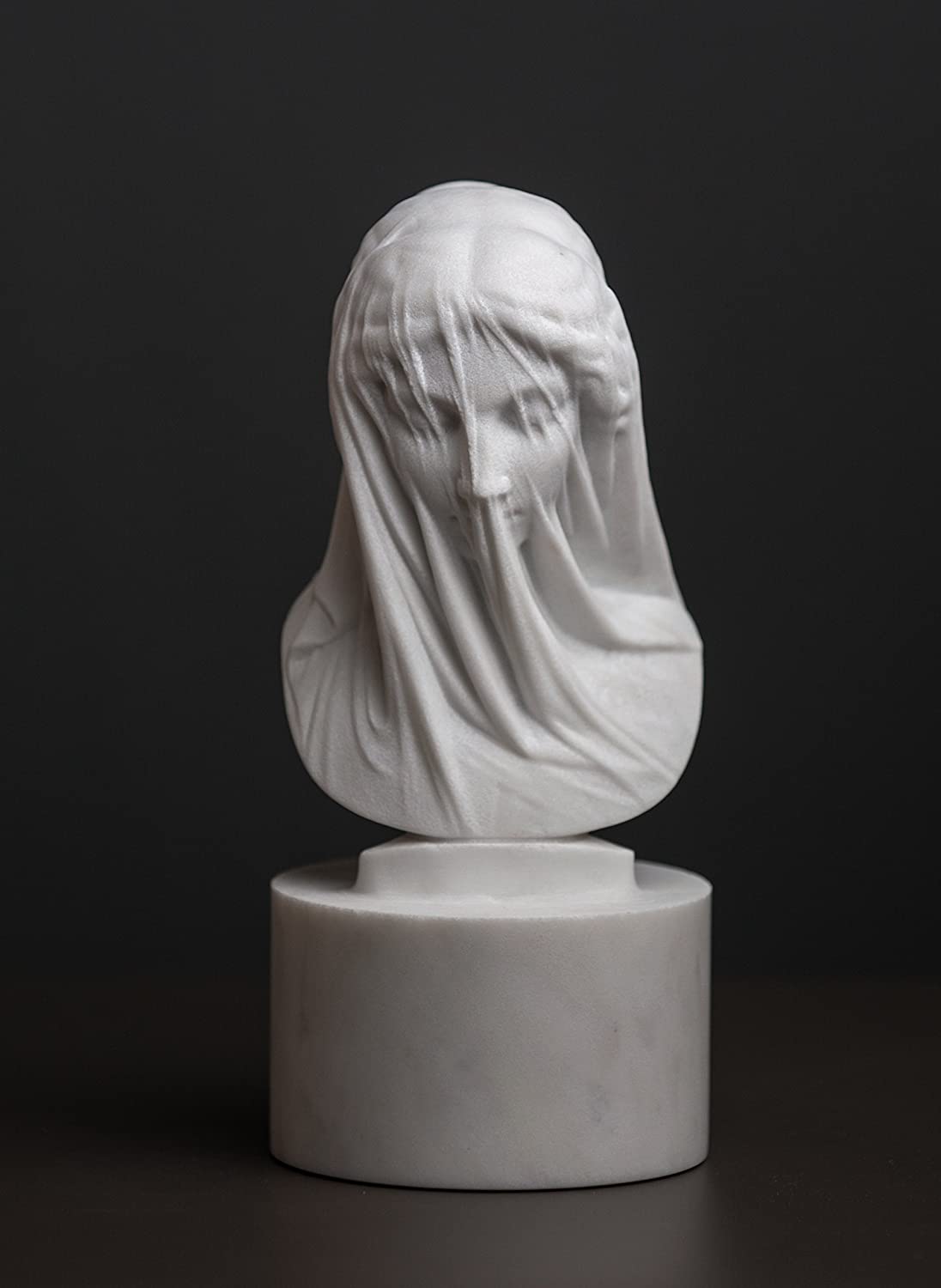 The illusion of transparent cloth from pure marble (The Veiled