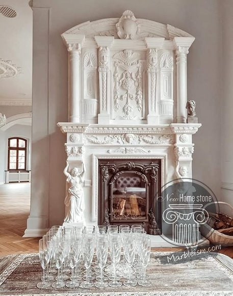 Marble feature wall with a fireplace beneath